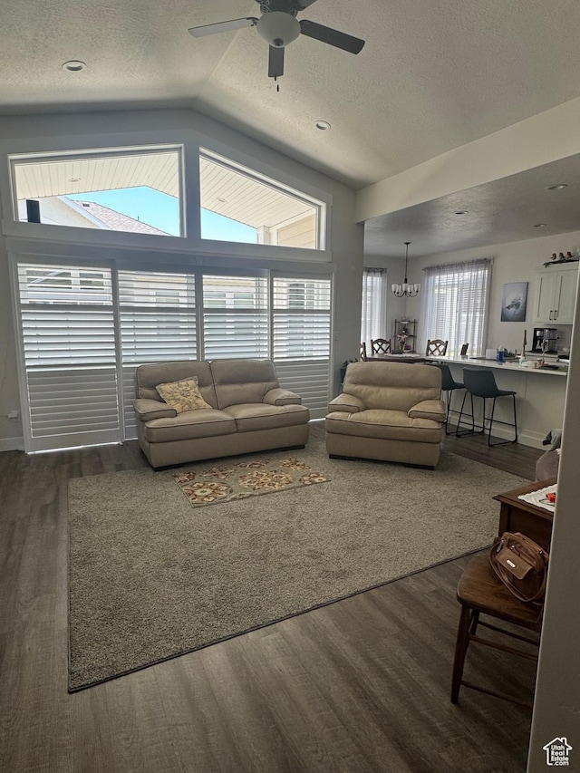 5593 W 5550 S, Hooper, UT 84315 - living room with a textured ceiling, ceiling fan, dark wood-type flooring, and vaulted ceiling