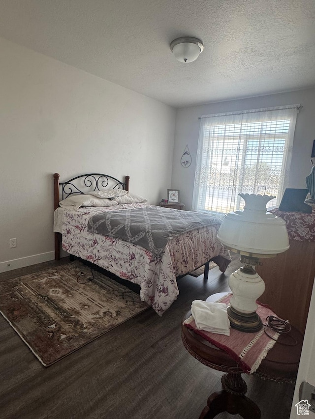 5593 W 5550 S, Hooper, UT 84315 - bedroom with wood finished floors and a textured ceiling
