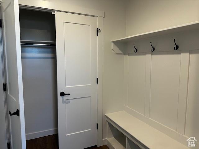 3581 W 725 S Unit 105, West Weber, UT 84401 - mudroom featuring baseboards and dark wood-type flooring