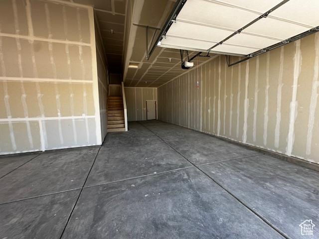3581 W 725 S Unit 105, West Weber, UT 84401 - garage featuring a garage door opener