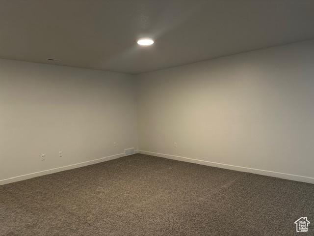 3581 W 725 S Unit 105, West Weber, UT 84401 - spare room with dark carpet and recessed lighting