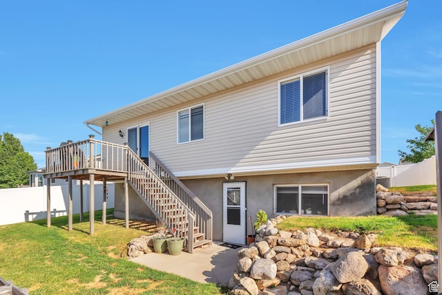6088 W Graceland Way, West Jordan, UT 84081 - back of house featuring a wooden deck and stairway