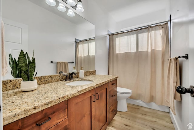 468 W Sunnyrise Ln S, Stansbury Park, UT 84074 - full bathroom featuring vanity, wood finished floors, and shower / bath combination with curtain