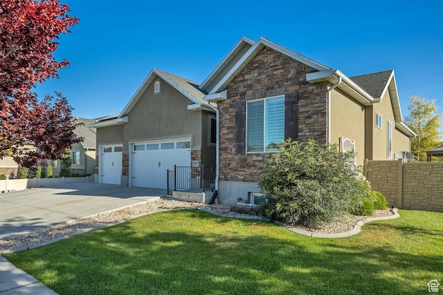 468 W Sunnyrise Ln S, Stansbury Park, UT 84074 - view of front facade featuring stone siding, stucco siding, concrete driveway, and a garage