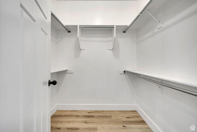 468 W Sunnyrise Ln S, Stansbury Park, UT 84074 - walk in closet featuring light wood-style floors