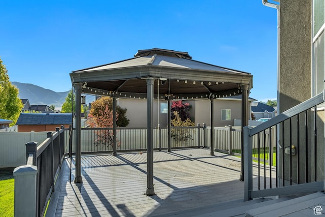 468 W Sunnyrise Ln S, Stansbury Park, UT 84074 - wooden deck with a gazebo and a mountain view