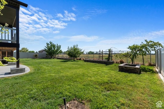 1717 N 4325 W, West Point, UT 84015 - fenced backyard featuring a vegetable garden