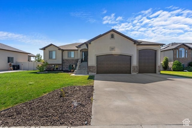 1717 N 4325 W, West Point, UT 84015 - french country inspired facade with stucco siding, driveway, a garage, and stone siding