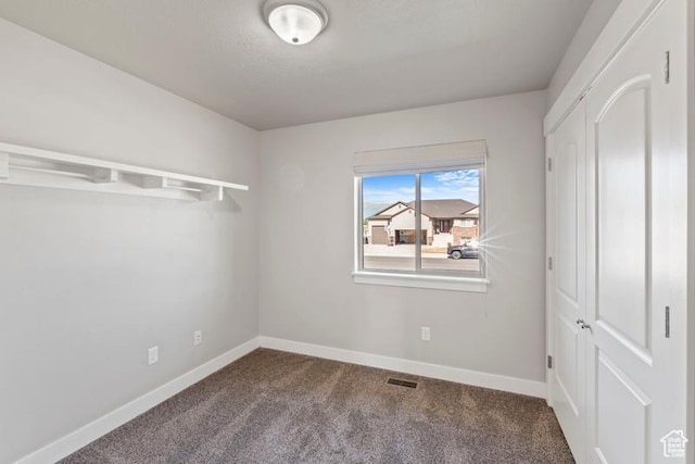 1717 N 4325 W, West Point, UT 84015 - unfurnished bedroom with carpet flooring and baseboards