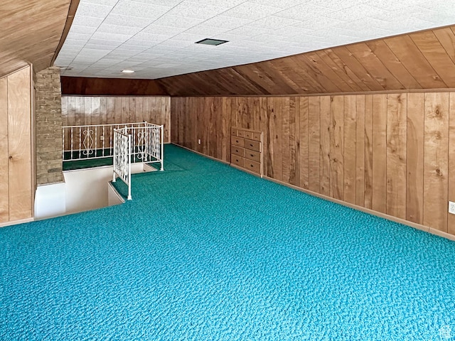 140 W 100 N, Castle Dale, UT 84513 - additional living space with wooden walls, carpet floors, and lofted ceiling