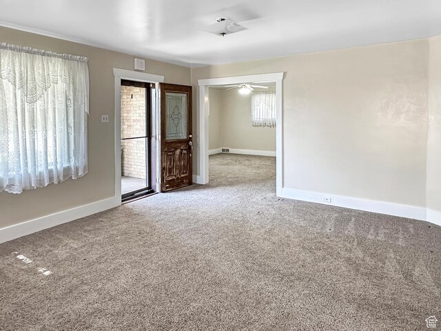 140 W 100 N, Castle Dale, UT 84513 - carpeted empty room with baseboards and a ceiling fan