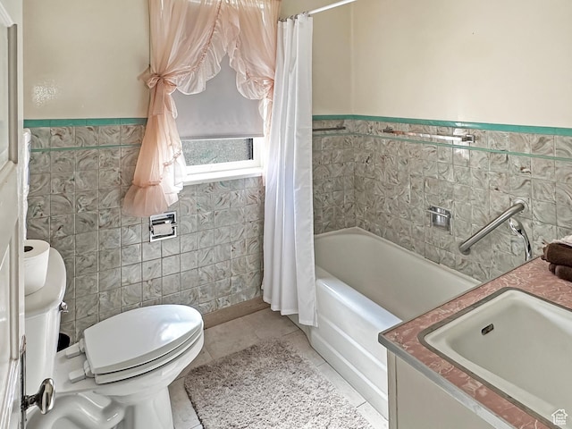 140 W 100 N, Castle Dale, UT 84513 - full bathroom featuring tile walls, tile patterned flooring, vanity, a wainscoted wall, and shower / bath combination with curtain