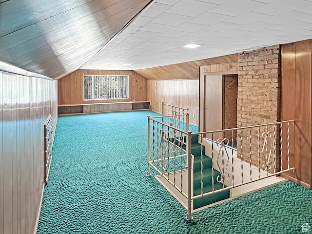 140 W 100 N, Castle Dale, UT 84513 - additional living space featuring wooden walls, carpet floors, and vaulted ceiling