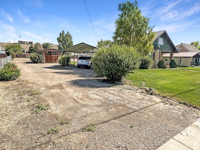140 W 100 N, Castle Dale, UT 84513 - view of front of house featuring a carport and driveway