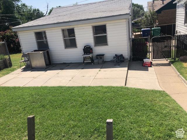 1191 E 20th, Ogden, UT 84401 - back of property featuring a gate and a patio