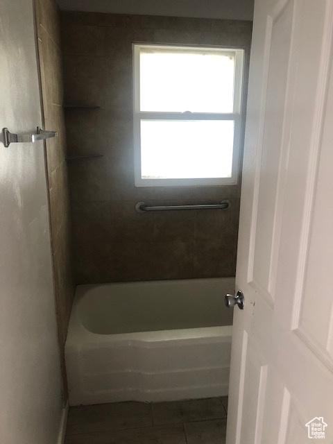 1191 E 20th, Ogden, UT 84401 - bathroom with tile patterned flooring and washtub / shower combination