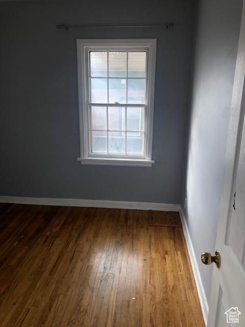 1191 E 20th, Ogden, UT 84401 - empty room featuring wood finished floors and baseboards