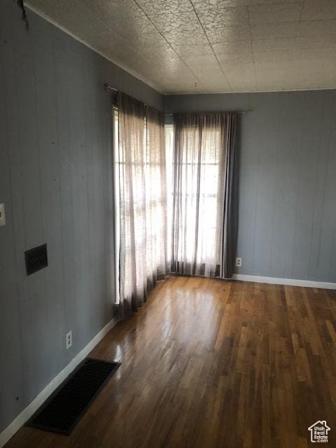1191 E 20th, Ogden, UT 84401 - empty room with wood finished floors and baseboards