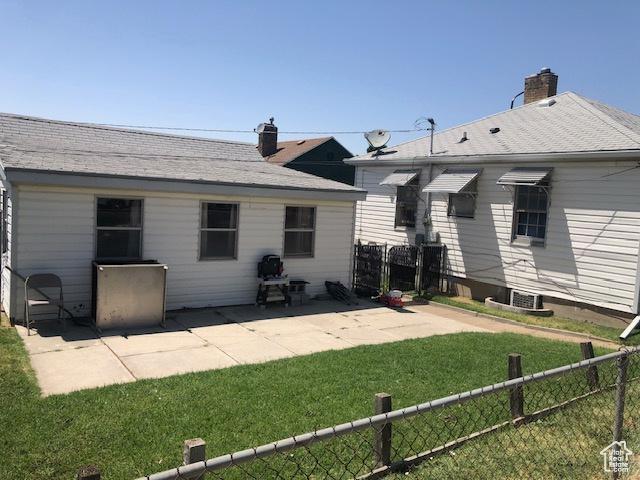 1191 E 20th, Ogden, UT 84401 - rear view of house featuring a patio and a chimney