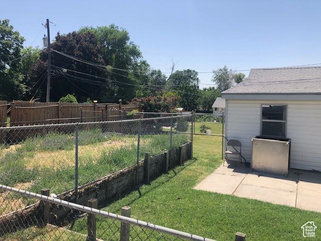 1191 E 20th, Ogden, UT 84401 - fenced yard featuring a patio area