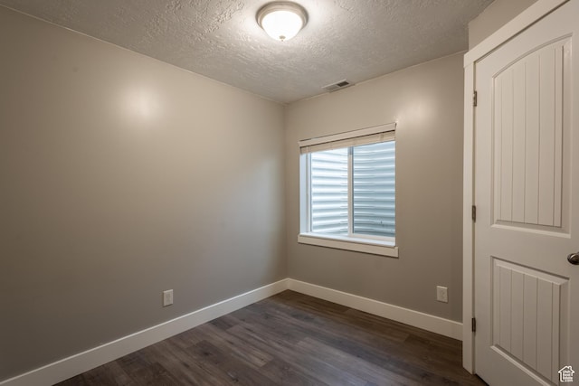 244 W 380 S Unit 10B, American Fork, UT 84003 - unfurnished room with a textured ceiling and dark wood finished floors