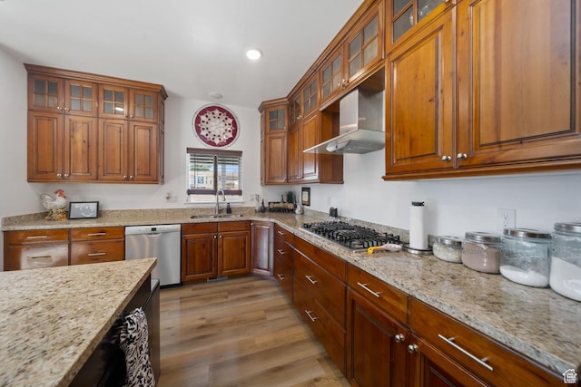 3601 S 5650 W, West Valley City, UT 84128 - kitchen with appliances with stainless steel finishes, wall chimney exhaust hood, brown cabinetry, light stone counters, and recessed lighting