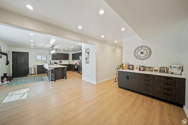 3601 S 5650 W, West Valley City, UT 84128 - living area with light wood-style floors and recessed lighting
