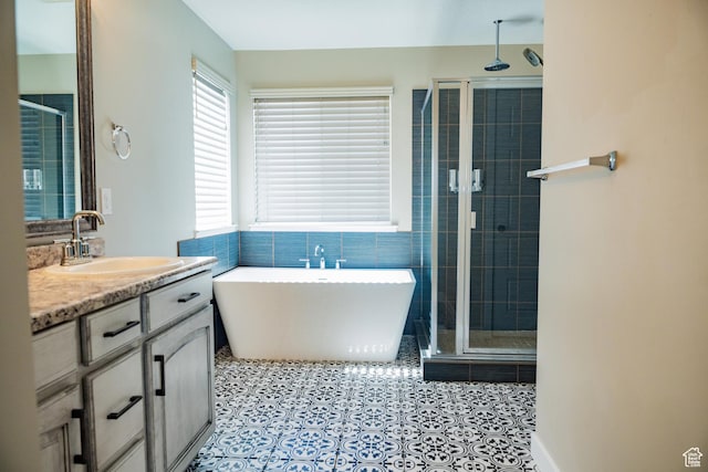 1272 E 1470 N, Payson, UT 84651 - full bath with a stall shower, vanity, a soaking tub, and tile patterned flooring