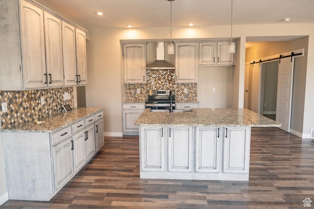 1272 E 1470 N, Payson, UT 84651 - kitchen with wall chimney exhaust hood, electric range, a barn door, a center island with sink, and dark wood-type flooring