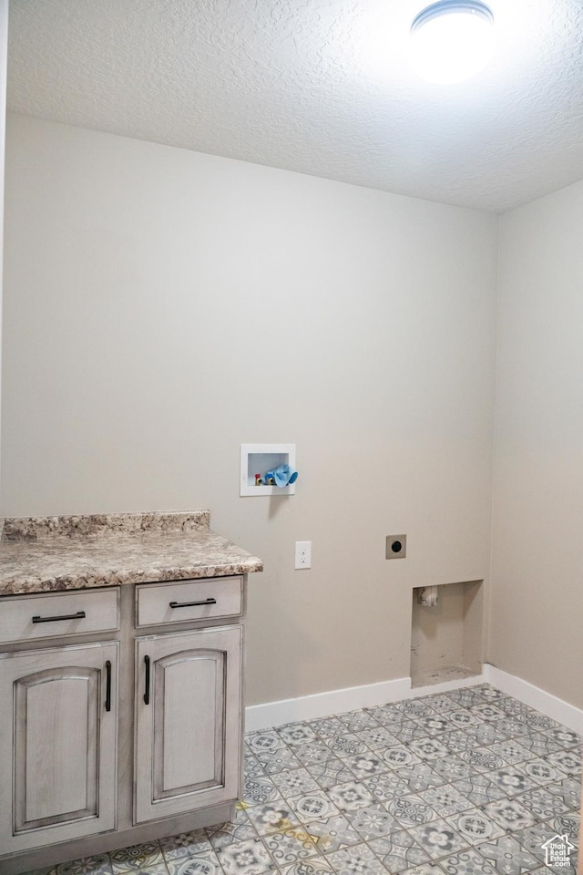 1272 E 1470 N, Payson, UT 84651 - washroom with electric dryer hookup, hookup for a washing machine, cabinet space, and a textured ceiling