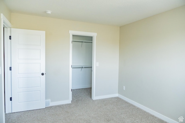 1272 E 1470 N, Payson, UT 84651 - unfurnished bedroom featuring carpet, a walk in closet, and a closet