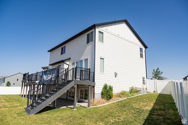 1272 E 1470 N, Payson, UT 84651 - rear view of house with stairway, a wooden deck, a fenced backyard, and board and batten siding