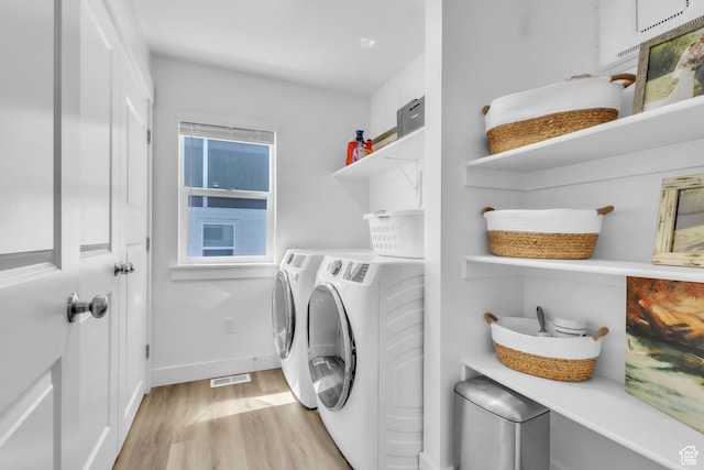 631 W 550 N, Smithfield, UT 84335 - laundry area featuring washing machine and dryer and light wood-type flooring