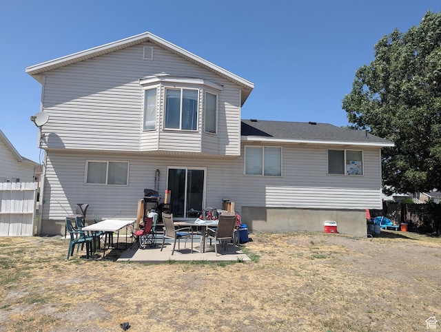 1831 W Dale Ridge Ave N, Salt Lake City, UT 84116 - back of house featuring a patio area