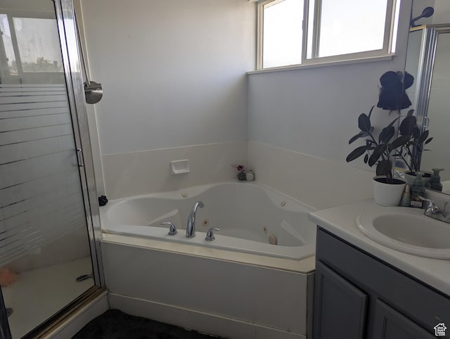 1831 W Dale Ridge Ave N, Salt Lake City, UT 84116 - full bathroom featuring a stall shower, vanity, and a tub with jets