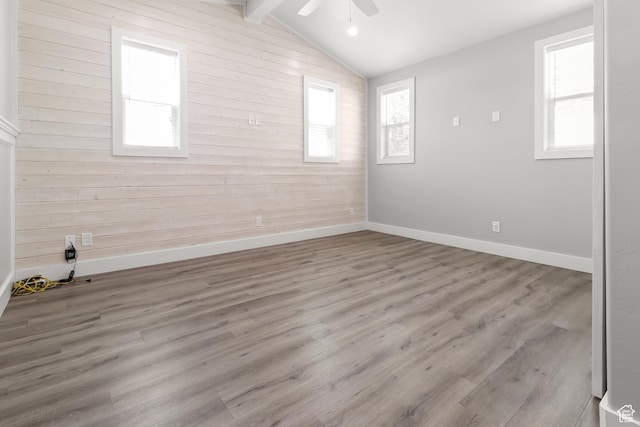 341 E 700 N, Spanish Fork, UT 84660 - unfurnished room with wood walls, ceiling fan, plenty of natural light, and wood finished floors