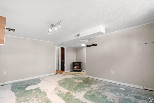 341 E 700 N, Spanish Fork, UT 84660 - unfurnished living room with a wood stove and concrete flooring