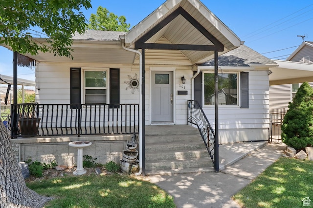 341 E 700 N, Spanish Fork, UT 84660 - view of front of property with a shingled roof and covered porch