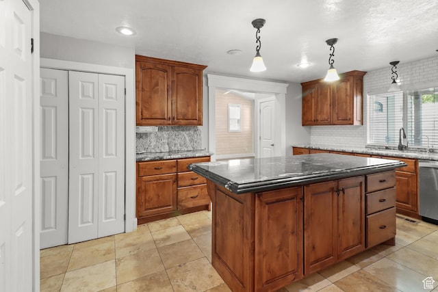 341 E 700 N, Spanish Fork, UT 84660 - kitchen with tasteful backsplash, pendant lighting, dishwasher, and dark stone countertops
