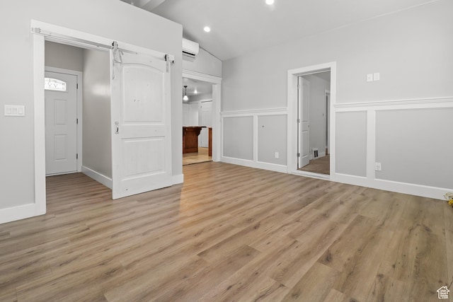 341 E 700 N, Spanish Fork, UT 84660 - unfurnished bedroom with light wood-style floors, vaulted ceiling, a decorative wall, recessed lighting, and ensuite bathroom