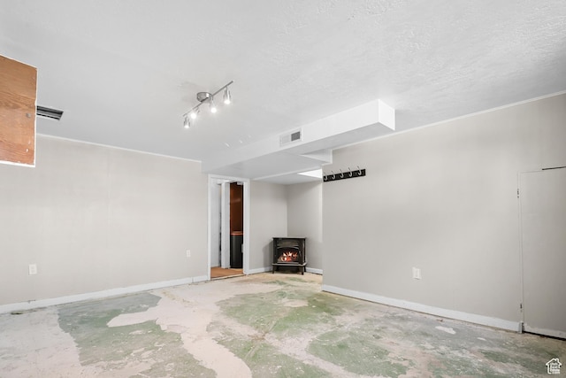 341 E 700 N, Spanish Fork, UT 84660 - unfurnished living room with a wood stove and unfinished concrete floors