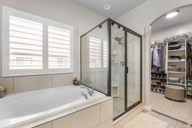 5671 S 650 E, Washington Terrace, UT 84405 - full bath with a bath, a shower stall, a walk in closet, and tile patterned floors