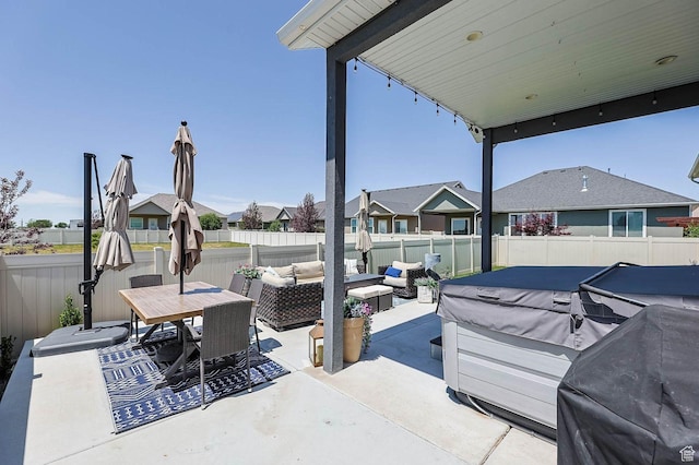 5671 S 650 E, Washington Terrace, UT 84405 - fenced backyard with outdoor lounge area, a patio area, a residential view, a hot tub, and outdoor dining space