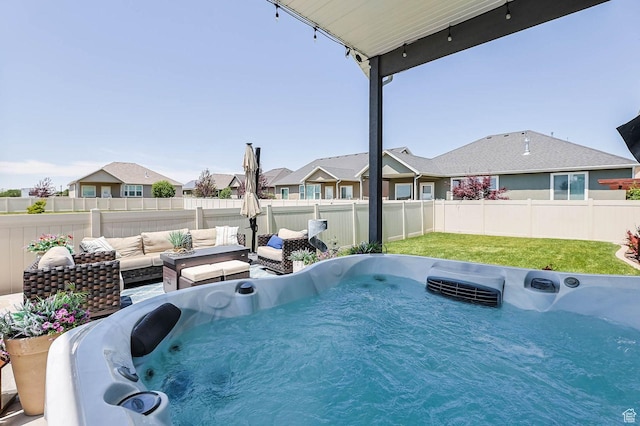 5671 S 650 E, Washington Terrace, UT 84405 - fenced backyard featuring an outdoor living space, a hot tub, and a residential view