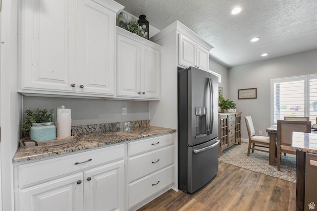 5671 S 650 E, Washington Terrace, UT 84405 - kitchen with stainless steel refrigerator with ice dispenser, white cabinets, dark wood-style flooring, a textured ceiling, and recessed lighting