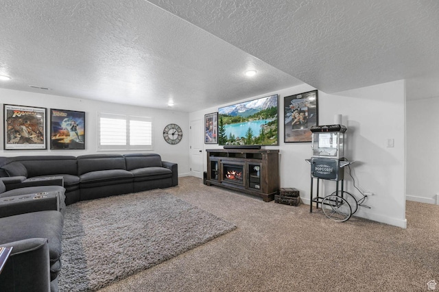 5671 S 650 E, Washington Terrace, UT 84405 - carpeted living area with a textured ceiling and a warm lit fireplace