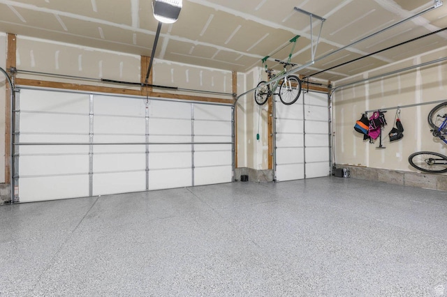 5671 S 650 E, Washington Terrace, UT 84405 - garage featuring a garage door opener
