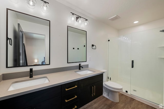 507 W 620 N Unit 127, Centerville, UT 84014 - full bath with wood finished floors, double vanity, a stall shower, and recessed lighting