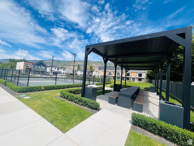507 W 620 N Unit 127, Centerville, UT 84014 - view of property's community with a tennis court, a residential view, and a mountain view
