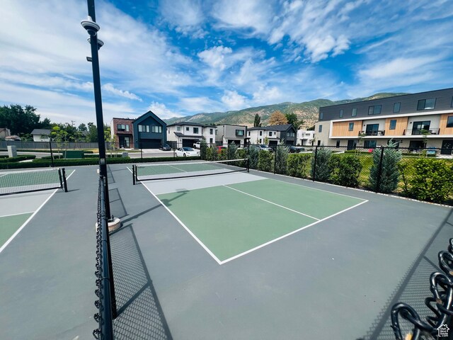 507 W 620 N Unit 127, Centerville, UT 84014 - view of tennis court featuring a mountain view and a residential view